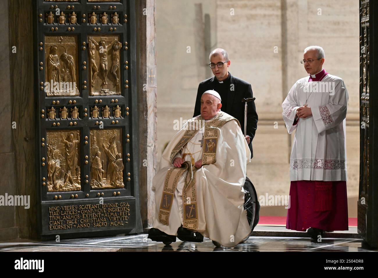 Pope Francis opens the Holy Door of St Peter's Basilica to mark the ...
