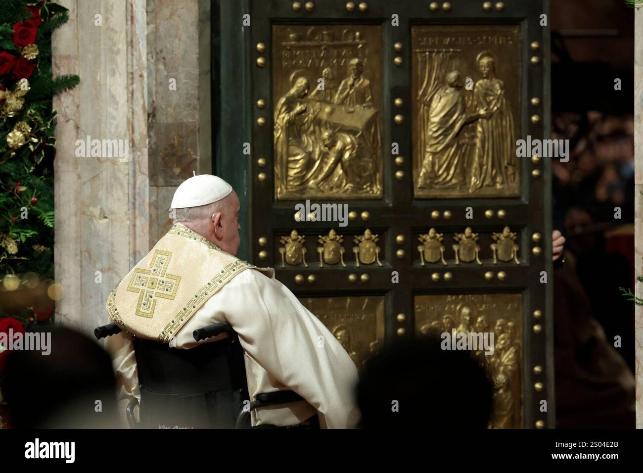 Pope Francis opens the Holy Door to mark the opening of the 2025