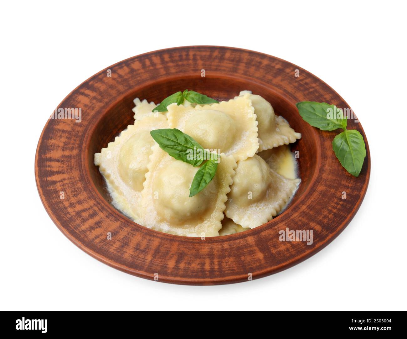 Delicious ravioli with cheese and basil in bowl isolated on white Stock ...