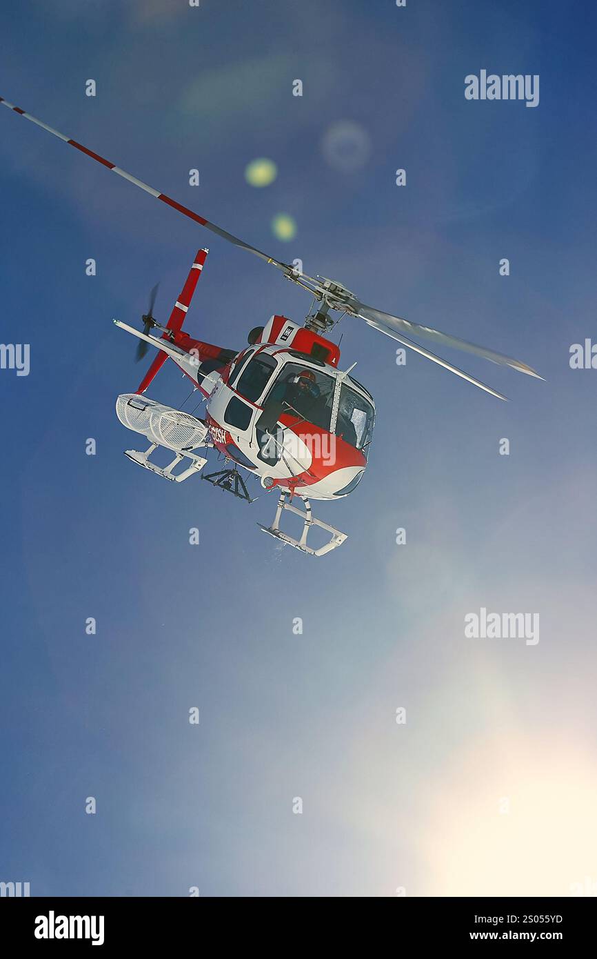Rescue helicopter in the mountains Stock Photo