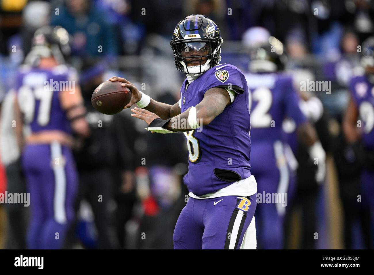 Baltimore Ravens quarterback Lamar Jackson (8) works out before an NFL