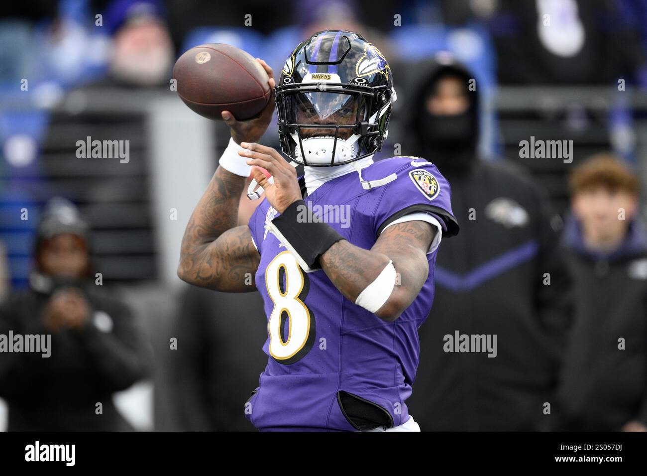 Baltimore Ravens quarterback Lamar Jackson (8) works out before an NFL