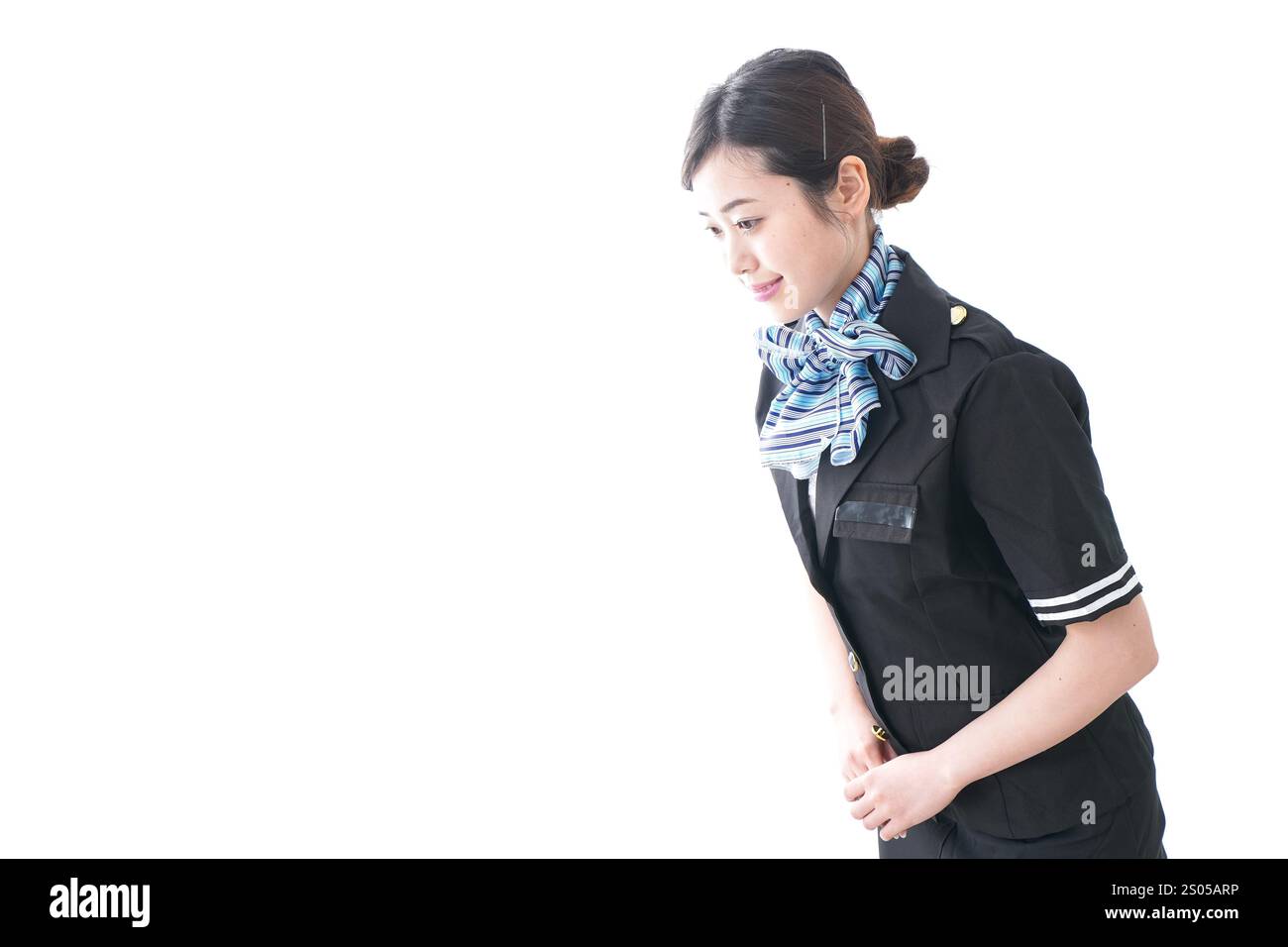 Cabin attendant bowing Stock Photo