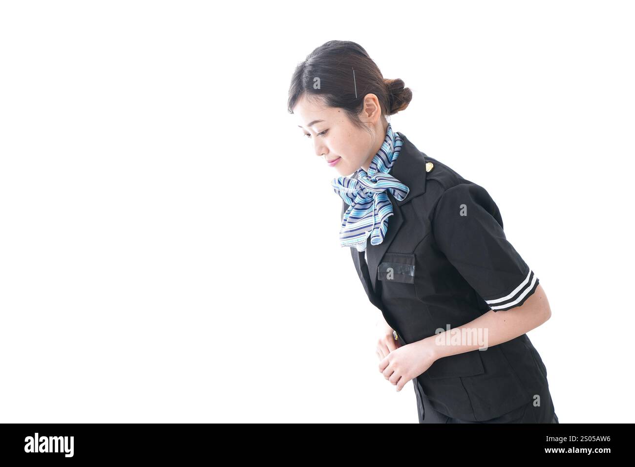 Cabin attendant bowing Stock Photo