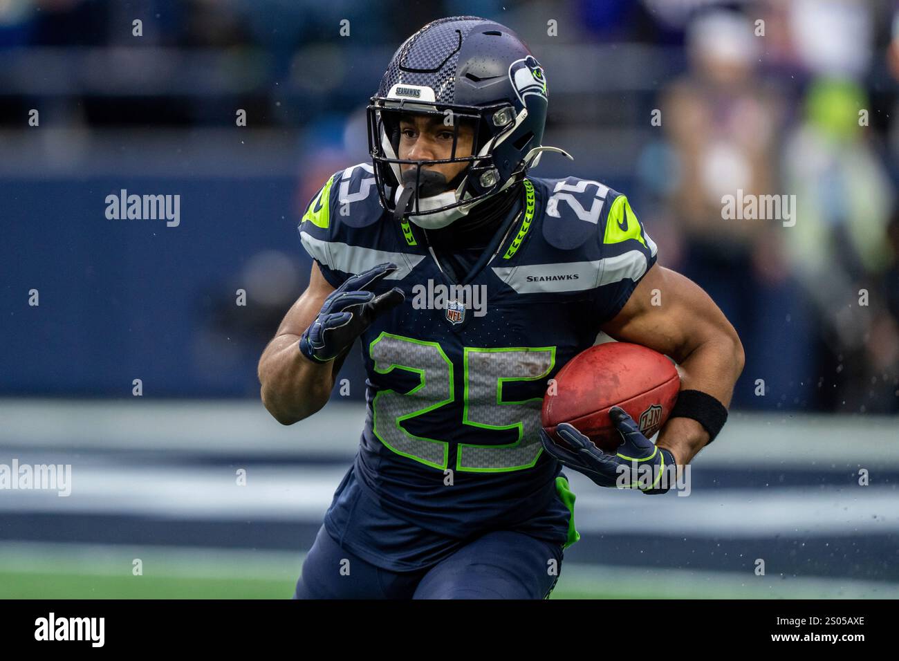 Seattle Seahawks running back Kenny McIntosh runs with the ball during