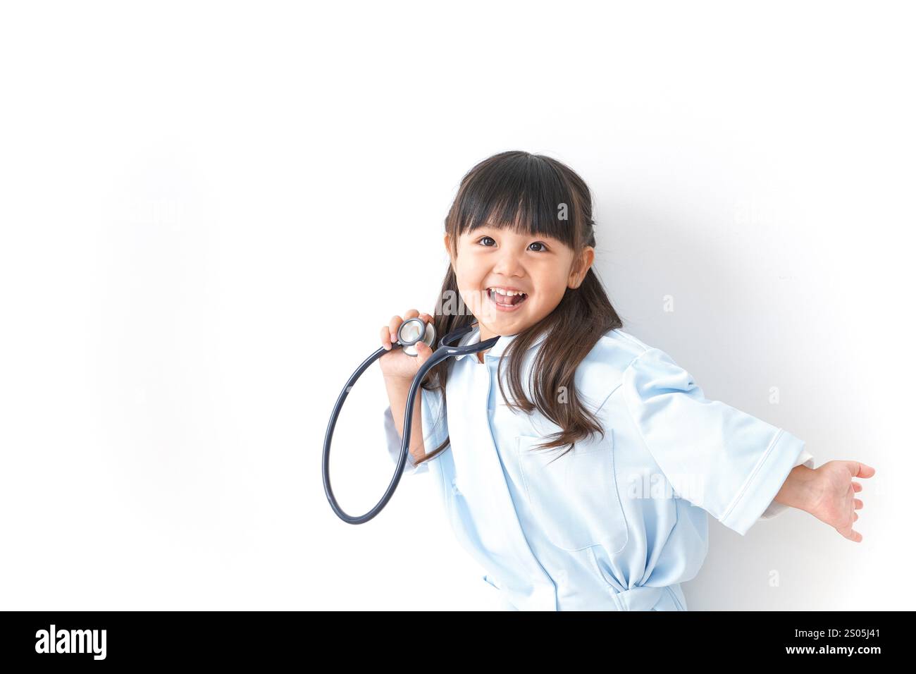 Girl playing nurse Stock Photo - Alamy