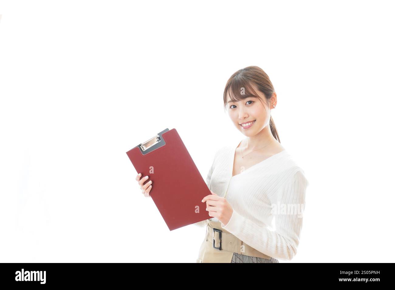 Young woman holding documents with a smile Stock Photo - Alamy