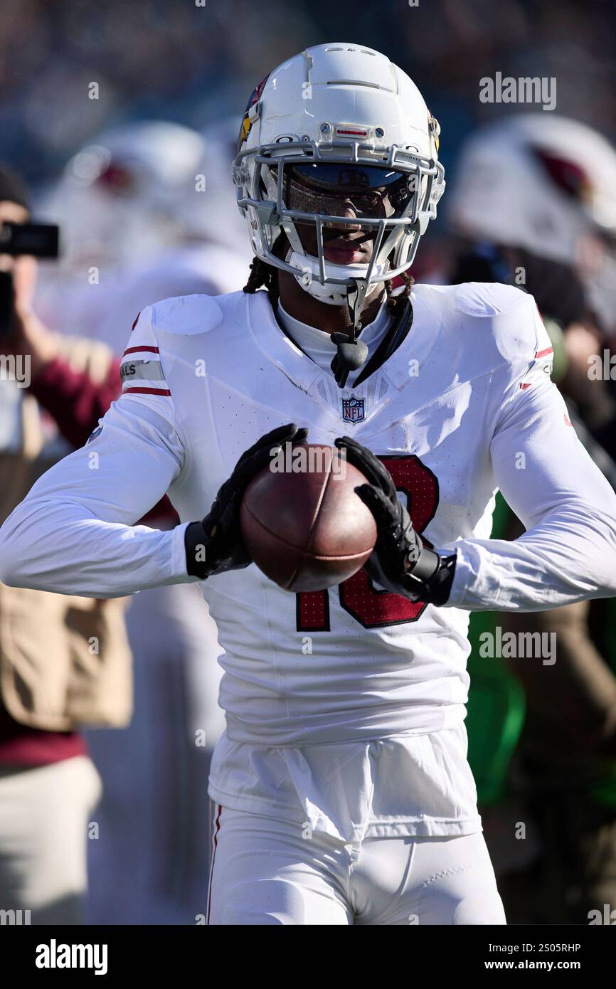 Lush Arizona Cardinals Wide Receiver Marvin Harrison Jr. Rings In An 18-yard Pass From Quarterback Jacoby Brissett Photo in HD Lush Arizona Cardinals Wide Receiver Marvin Harrison Jr. Rings In An 18-yard Pass From Quarterback Jacoby Brissett Photo in HD