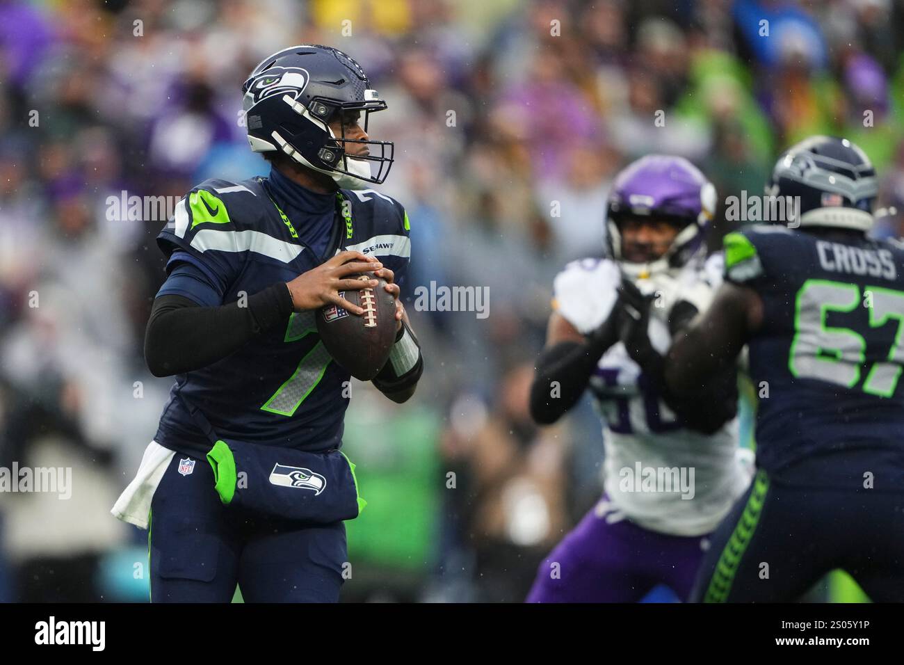 Seattle Seahawks quarterback Geno Smith looks to throw against the