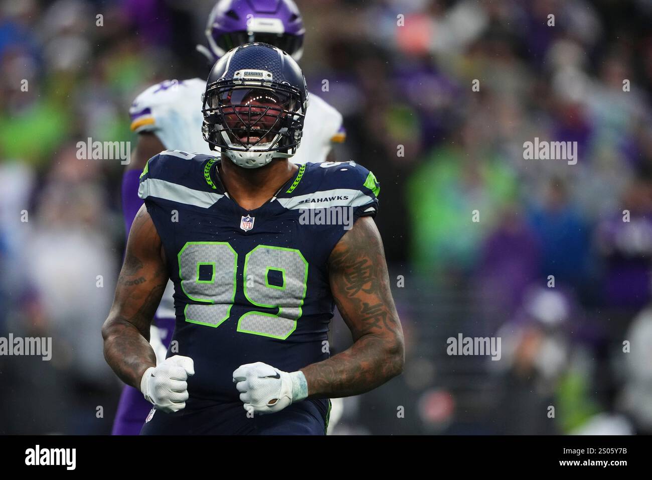 Seattle Seahawks defensive end Leonard Williams (99) reacts during an