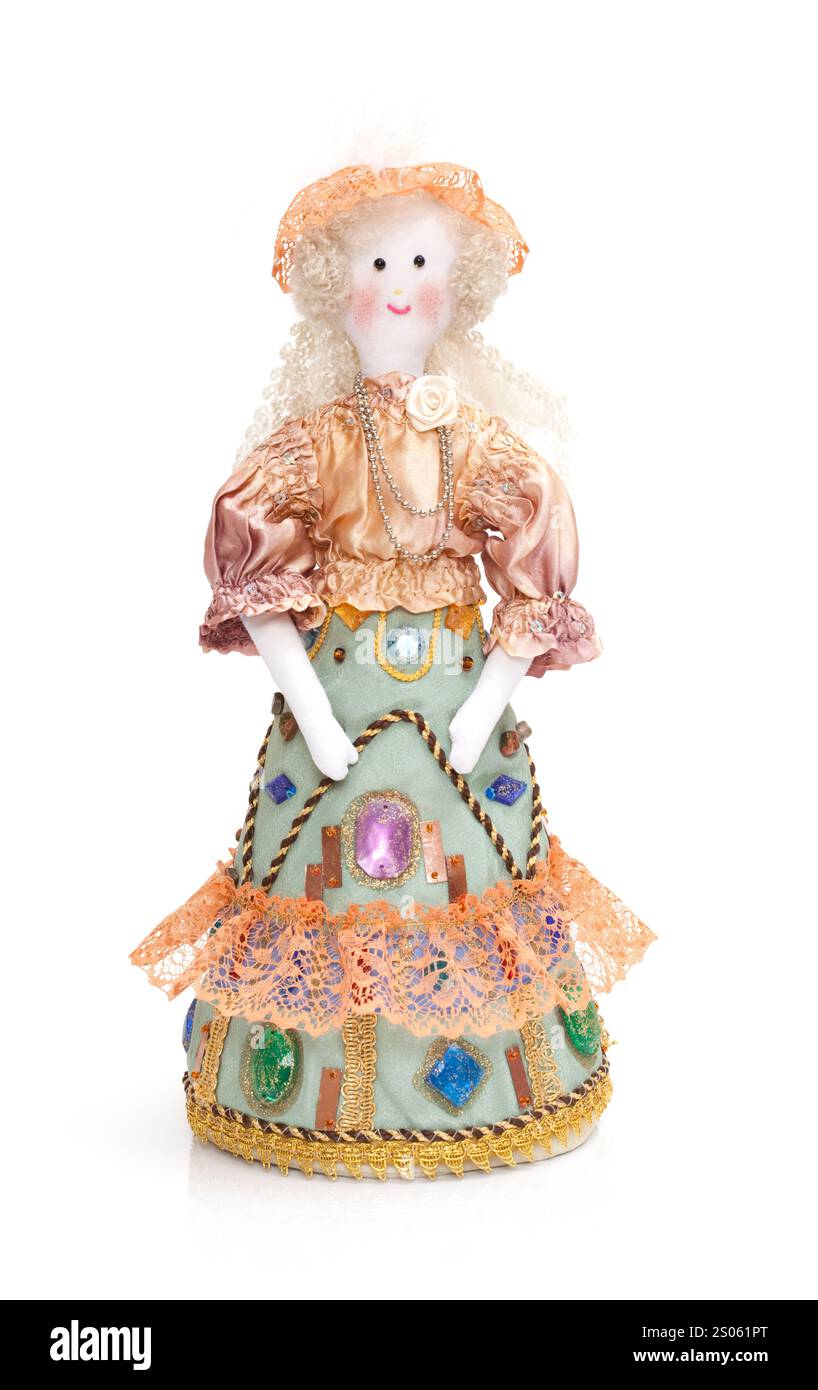 Hand made rag doll in traditional clothes over white Stock Photo - Alamy