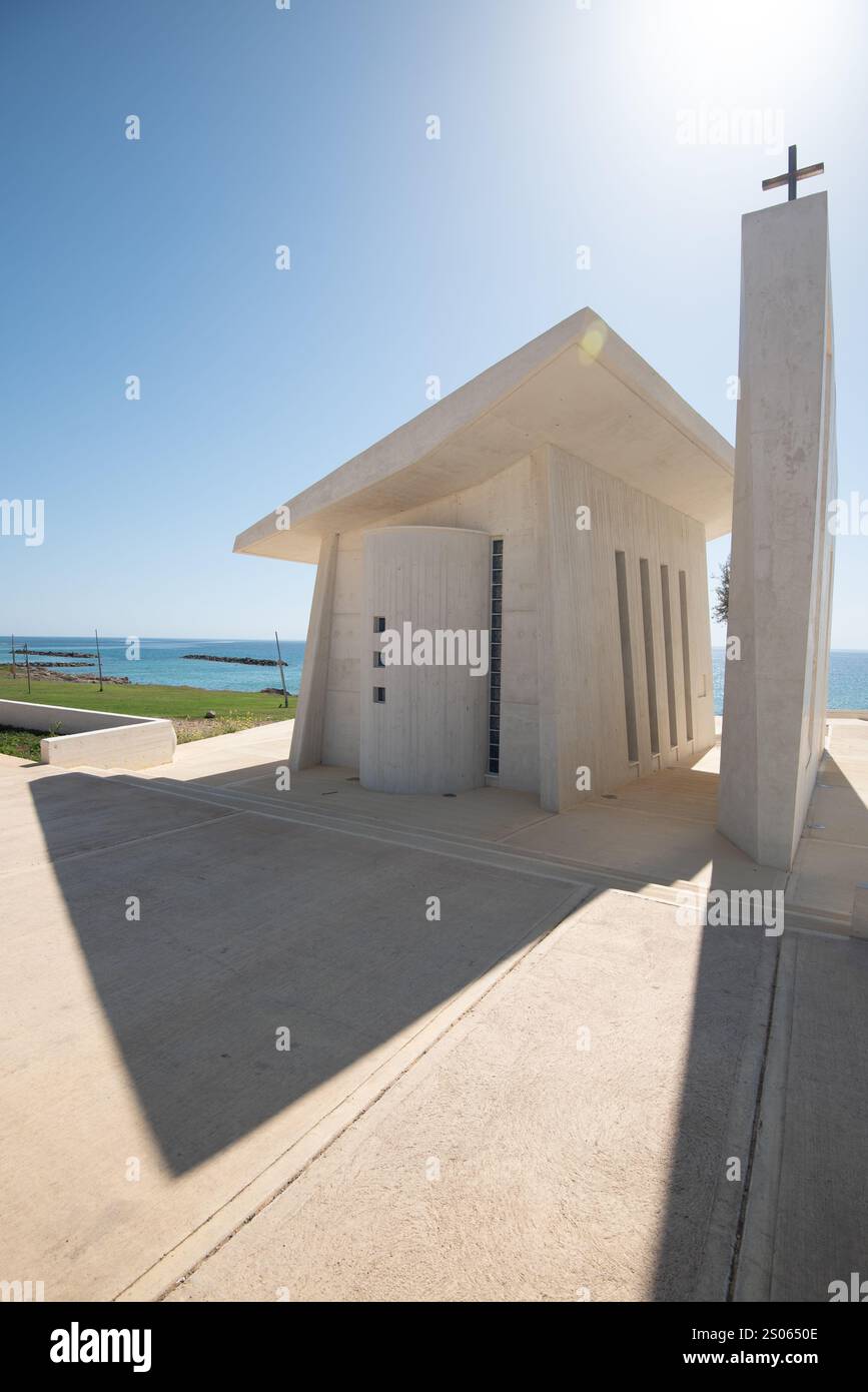 Sunlight illuminates a contemporary church with minimalist design. Panagia thalassini Paphos Stock Photo
