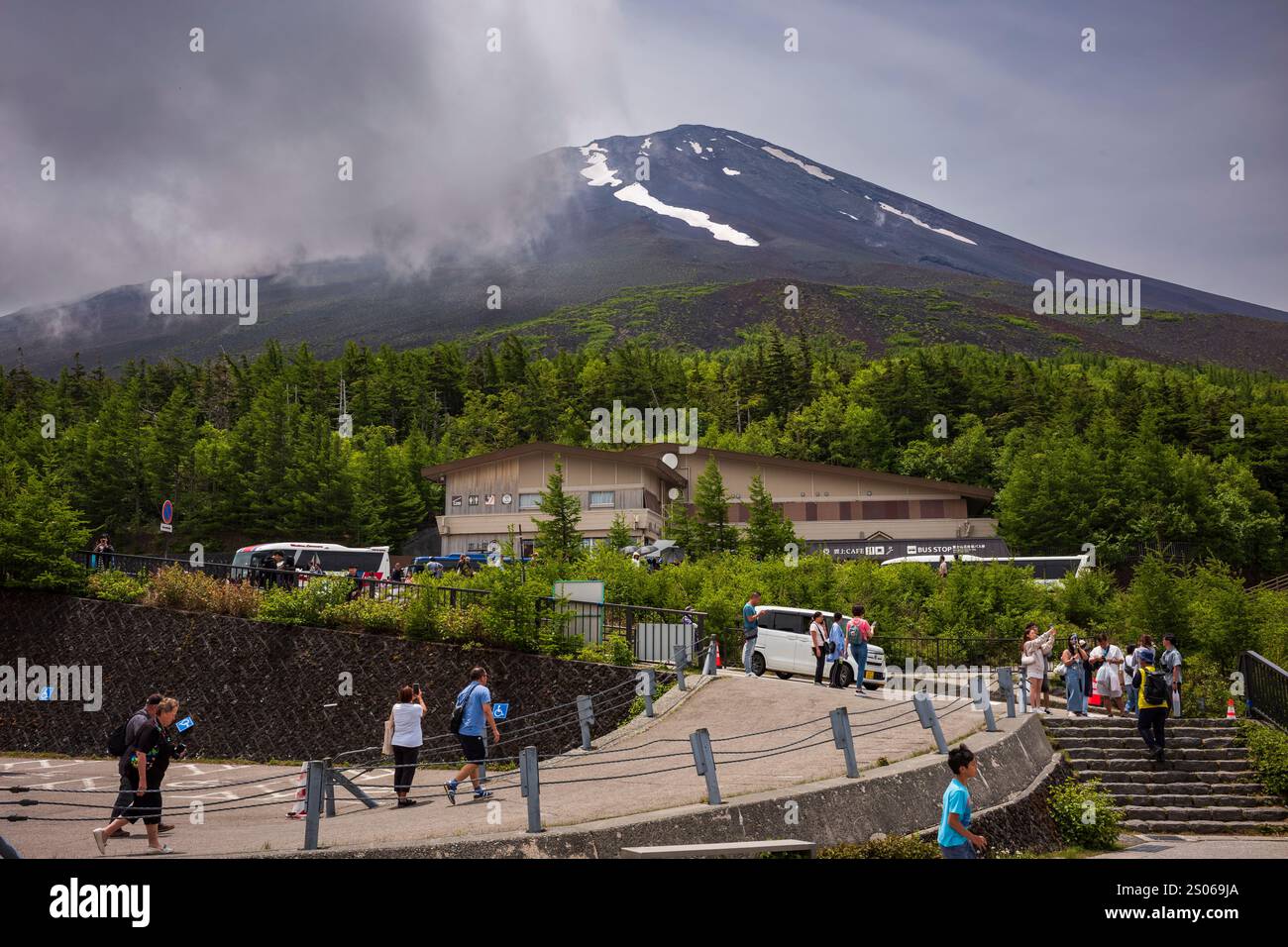 Fuji Hakone-Izu National Park, Japan, Jun 17, 2024: Tourists explore the 5th Station of Mt. Fugi during a cloudy, summer day. The attraction is a popu Stock Photo