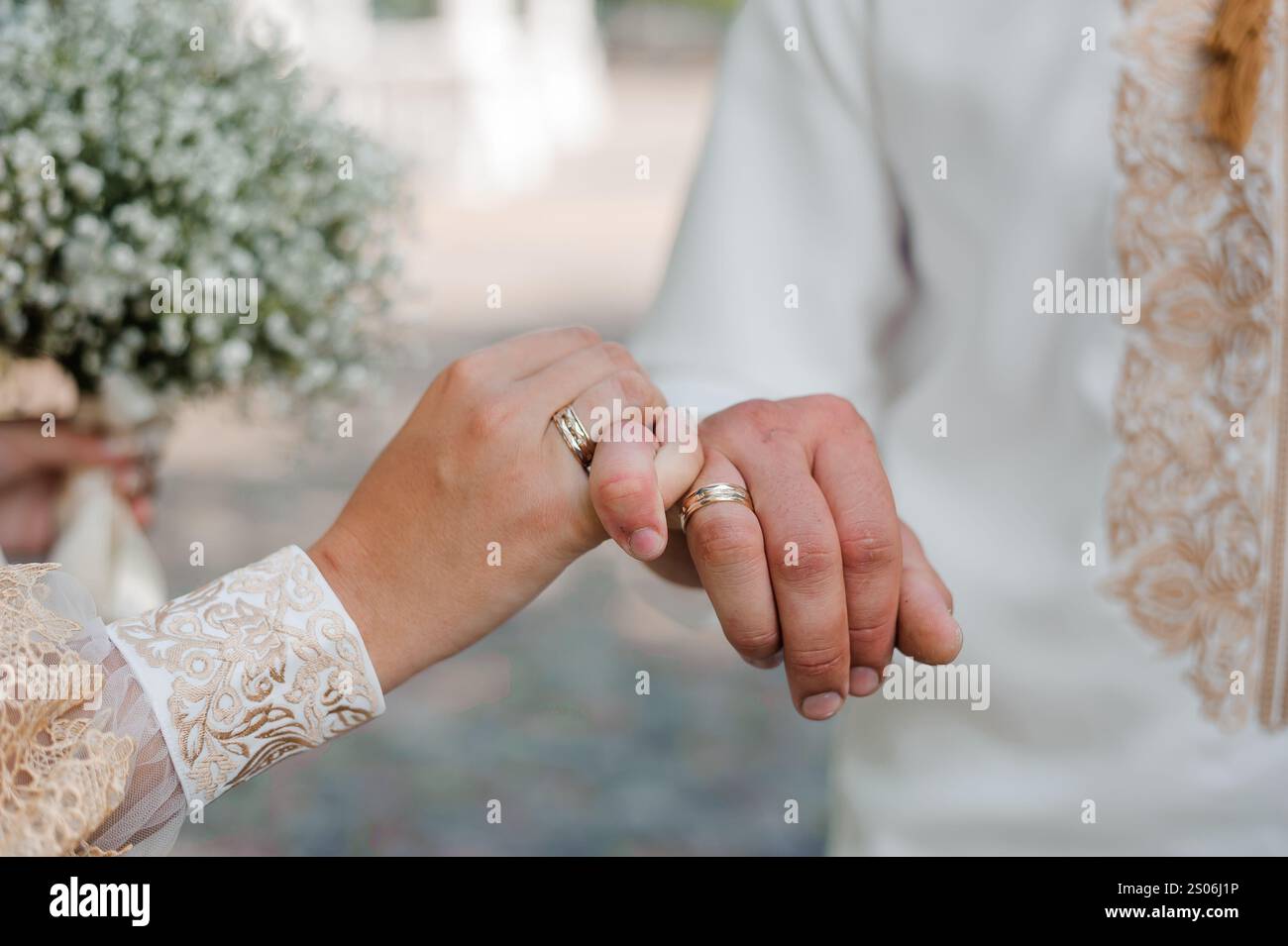 Intimate Exchange of Wedding Rings Under Soft Natural Light Stock Photo ...