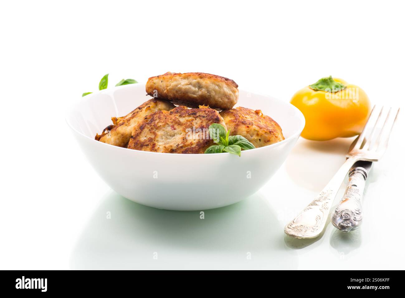 fried chicken cutlets in a bowl, isolated on white background Stock ...