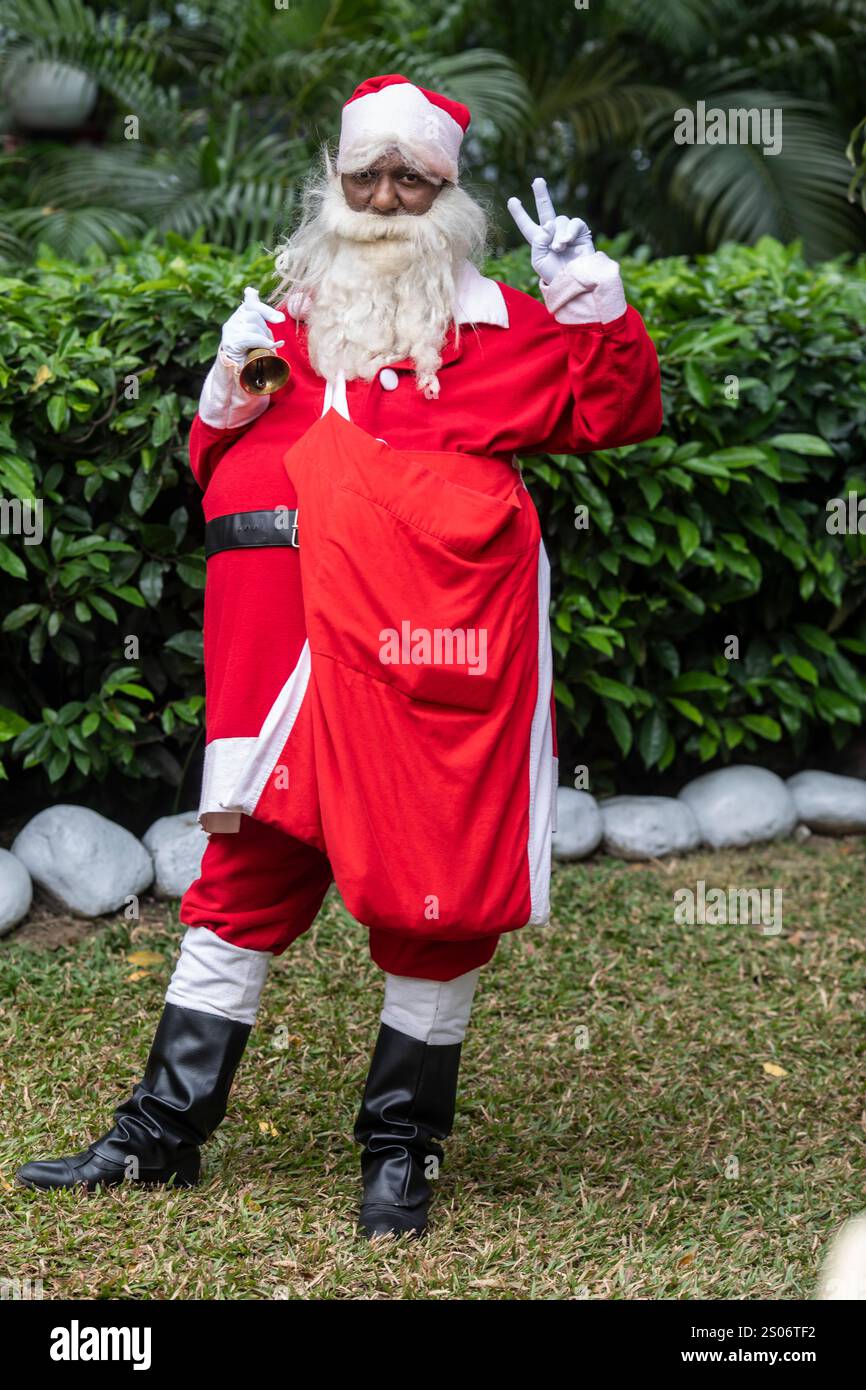 Santa claus poses for photos hi-res stock photography and images - Alamy
