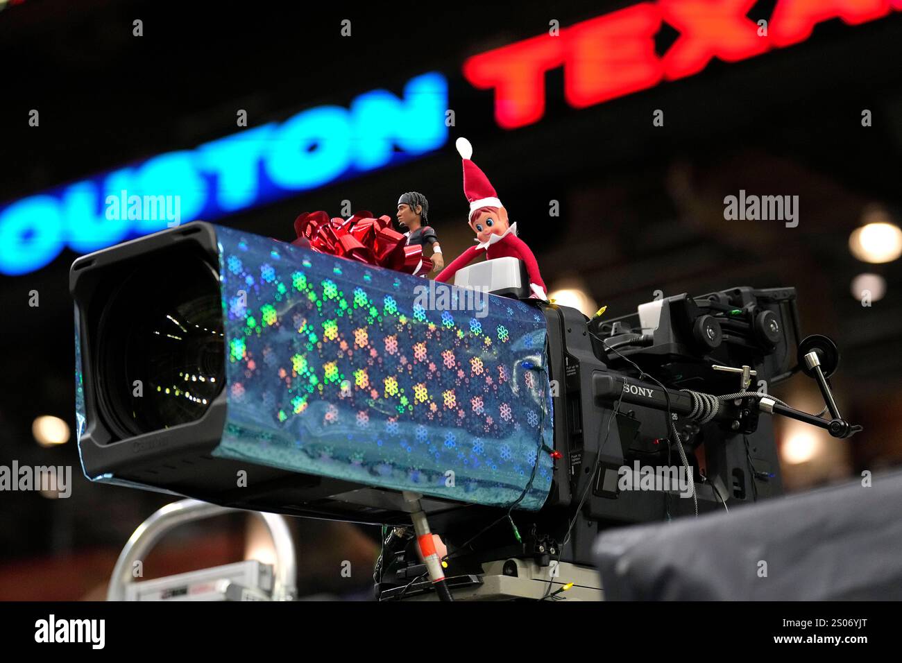 An Elf on a Shelf sits on a camera prior to the Christmas Day NFL