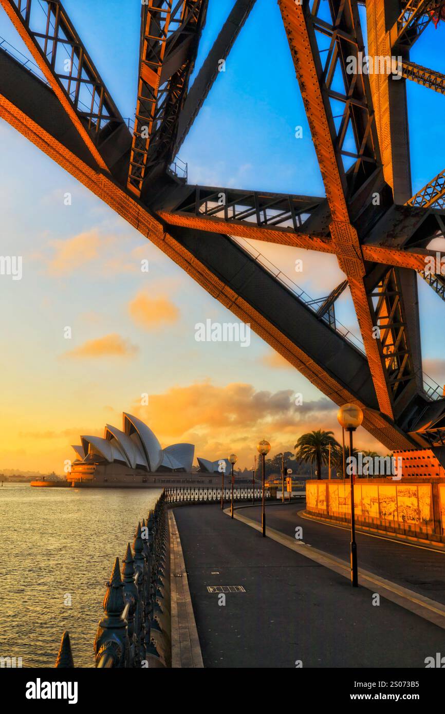 Fragment of the Sydney Harbour bridge from The Rocks in glorious morning soft light at sunrise. Stock Photo