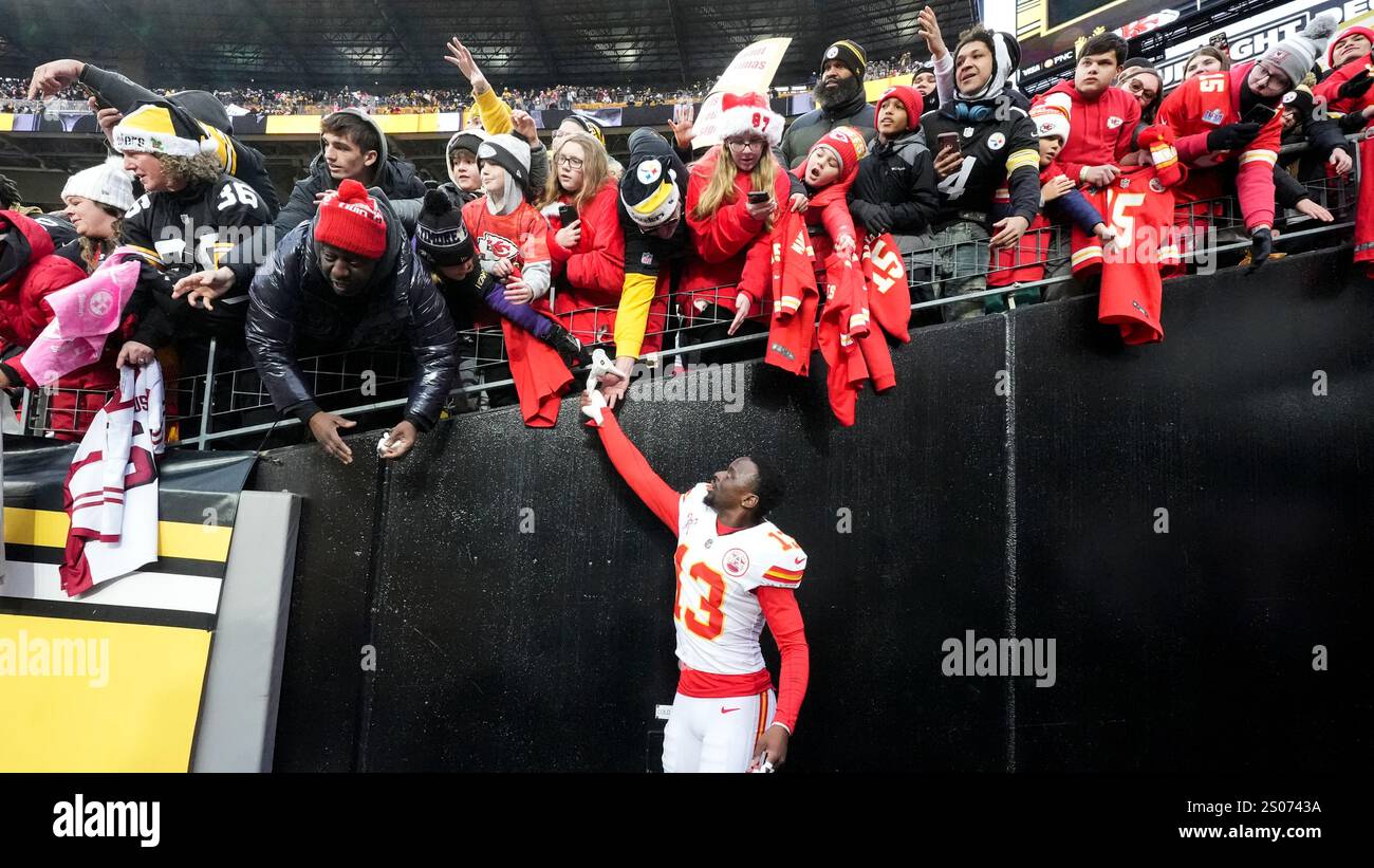Fans cheer for Kansas City Chiefs safety Nazeeh Johnson after an NFL