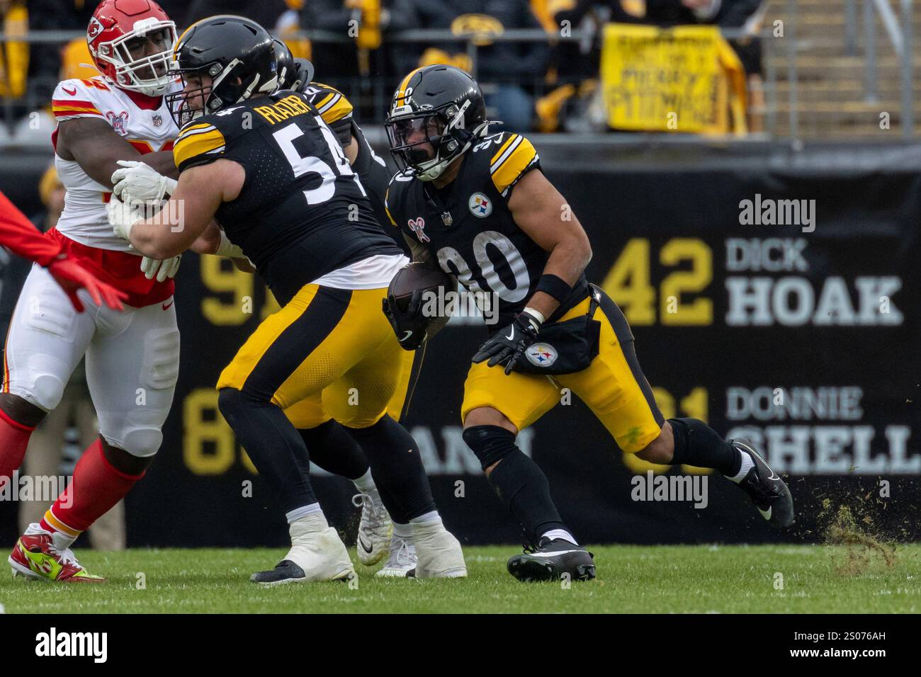 Pittsburgh Steelers running back Jaylen Warren (30) rushes during an