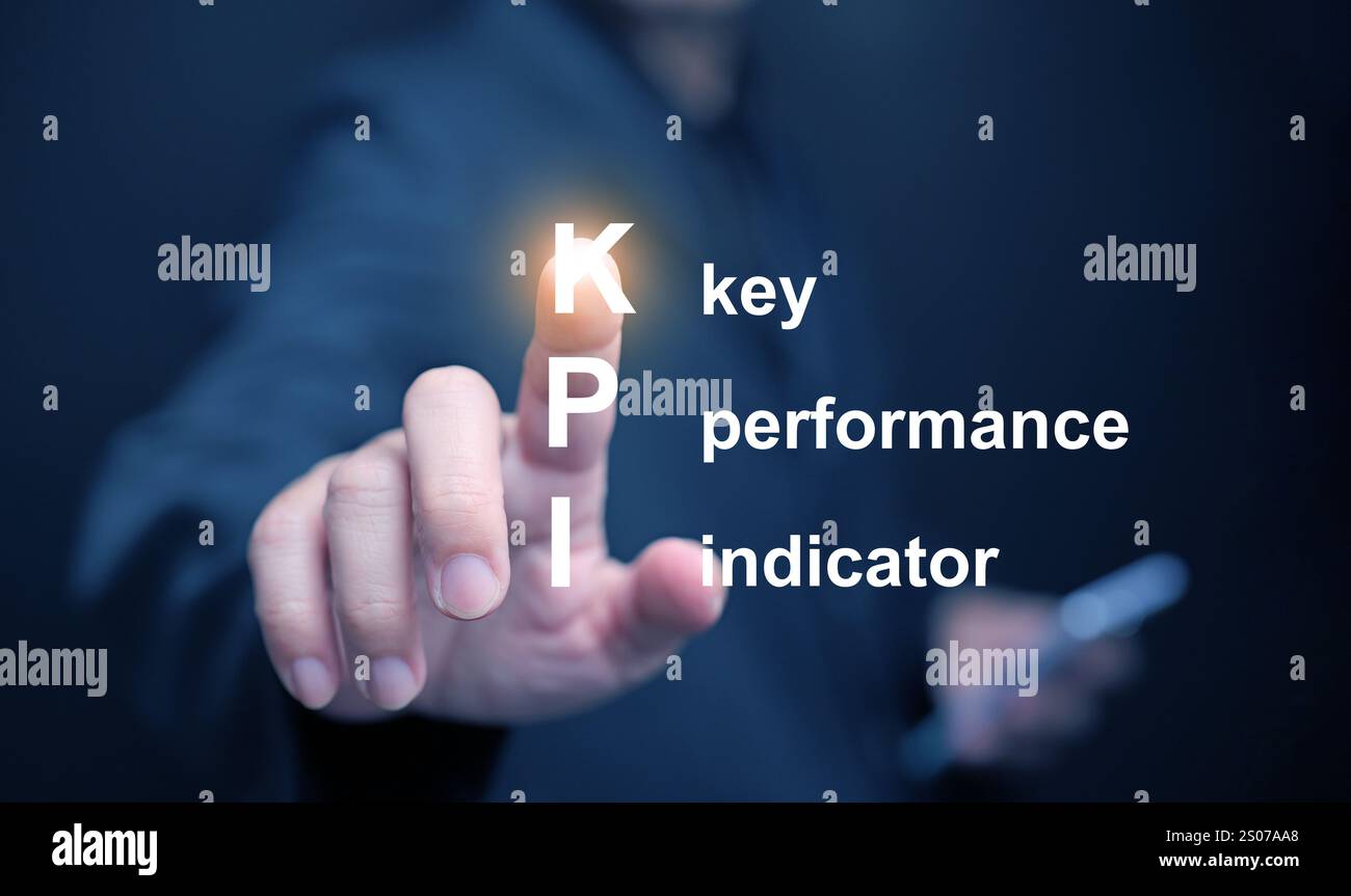 KPI key performance indicator. A businessman tapping on virtual screen to use KPIs to measure progress of his business, project, or work over time to Stock Photo
