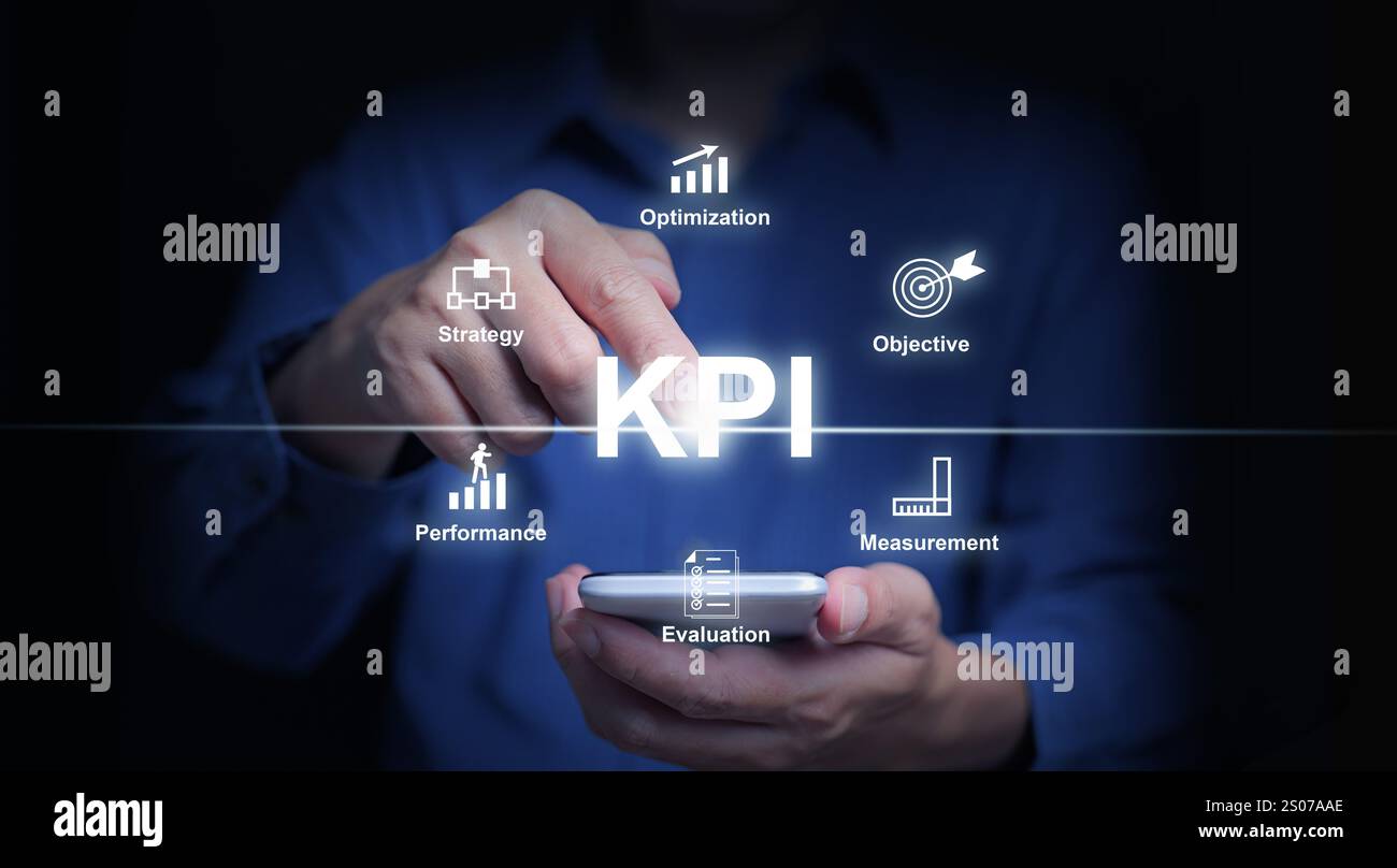 KPI key performance indicator. A businessman with a smartphone uses KPIs to measure progress of his business, project, or work over time to reach the Stock Photo