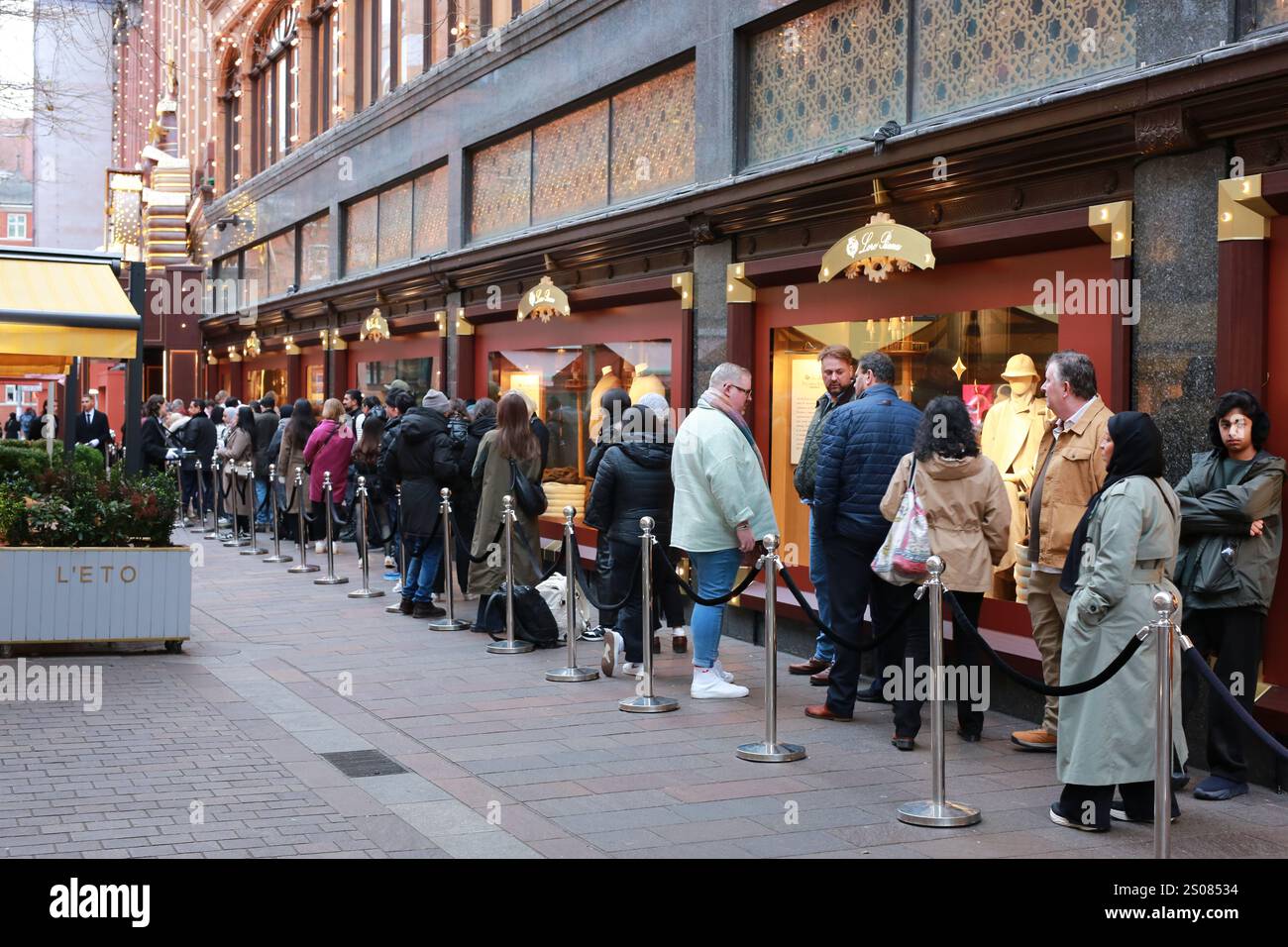 London, UK. 26 December 2024. Long queue outside Harrods store in ...