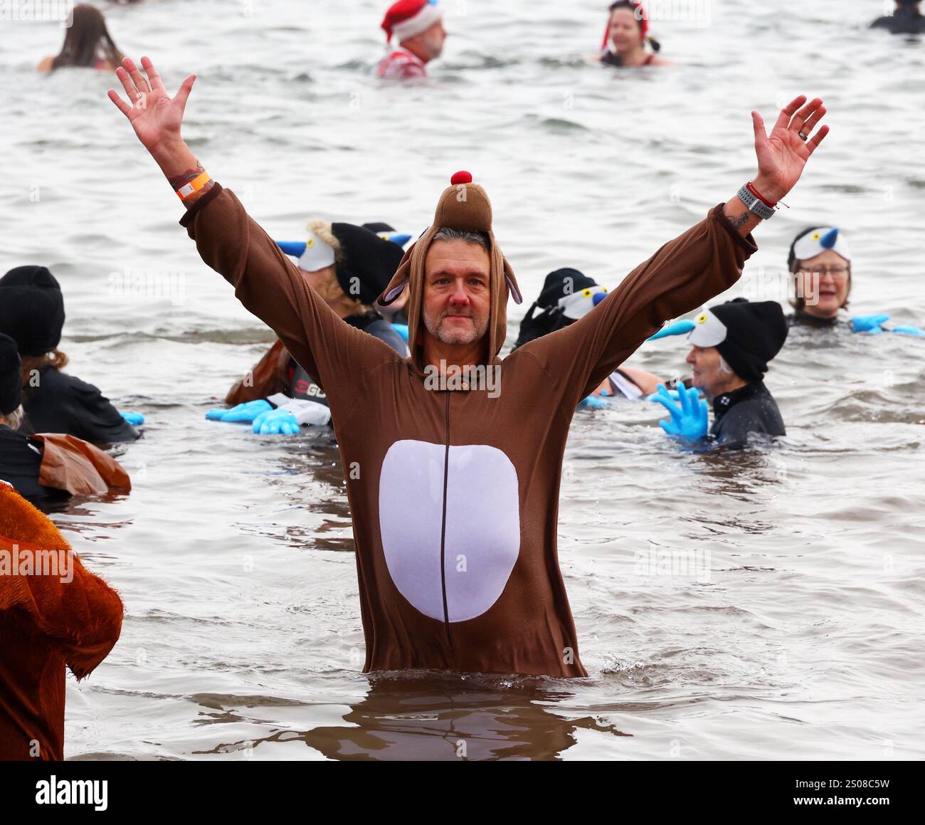 Teignmouth, Devon, UK. 26th December, 2024. Boxing Day dip. Teignmouth
