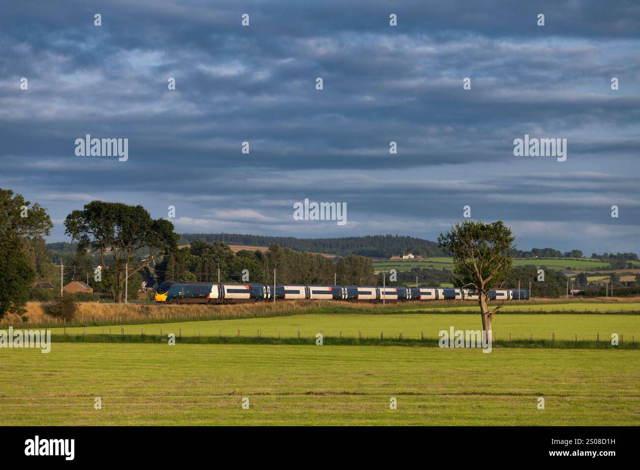 Avanti west coast class 390 Pendolino train passing the countryside at ...