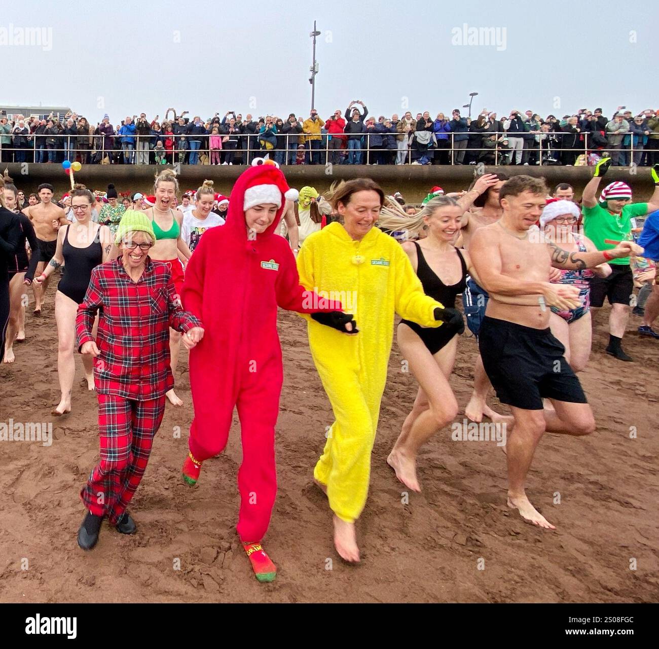 Teignmouth, Devon, UK. 26th December, 2024. Boxing Day dip. Teignmouth
