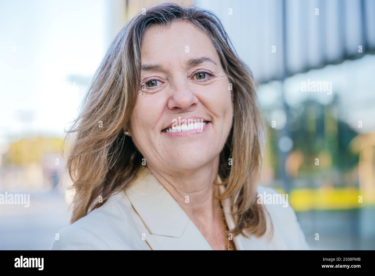 Smiling Mature Woman Portrait Outdoors Stock Photo