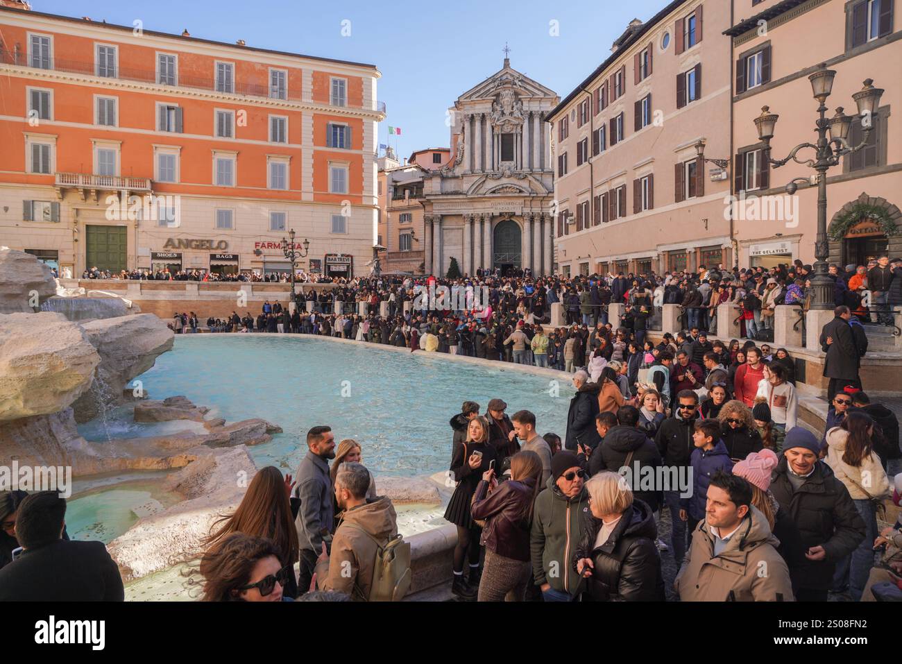 Rome, Italy. 26 December 2024 Large crowds of tourists gather in the ...