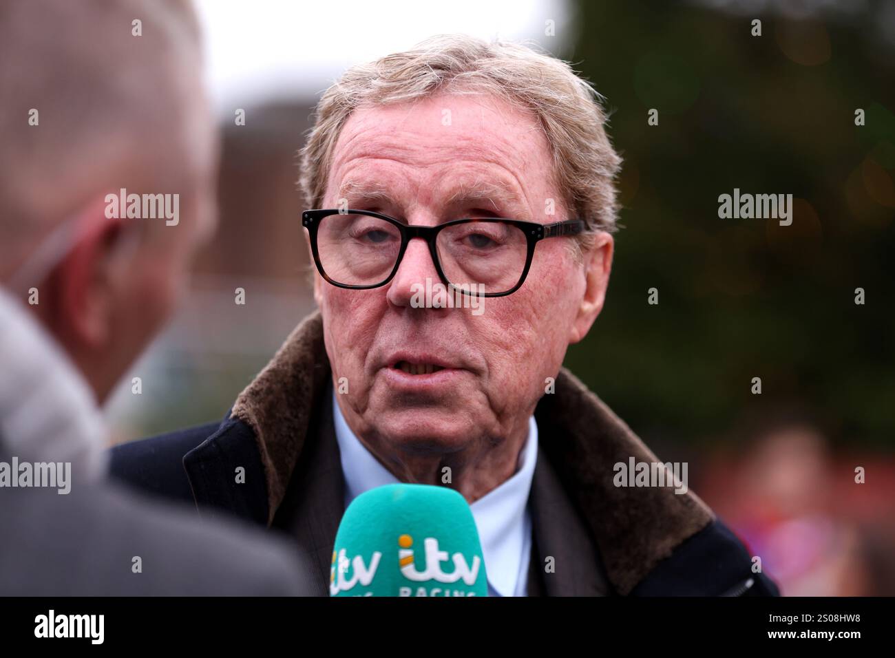 Harry Redknapp being interviewed by itv Racing on King VI Chase