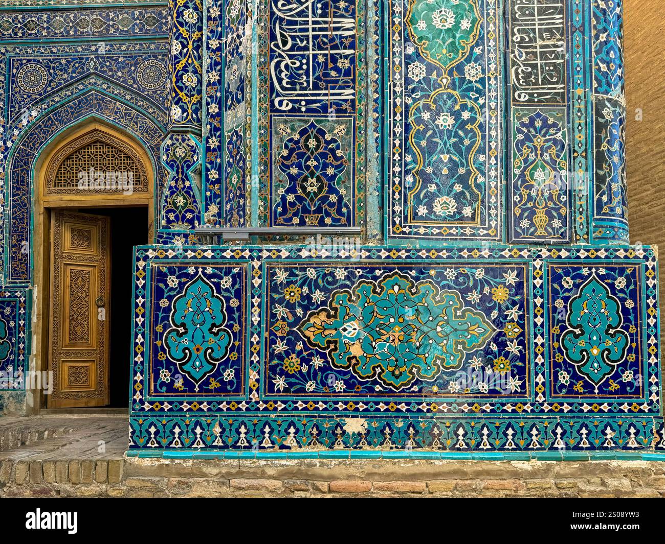Intricate Blue Mosaic Tiles on Historic Building Facade Stock Photo - Alamy