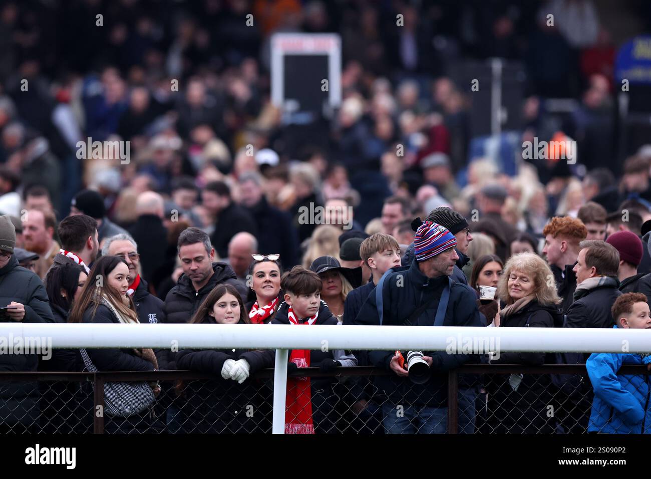 Spectators ahead of the Ladbrokes King VI Chase on King