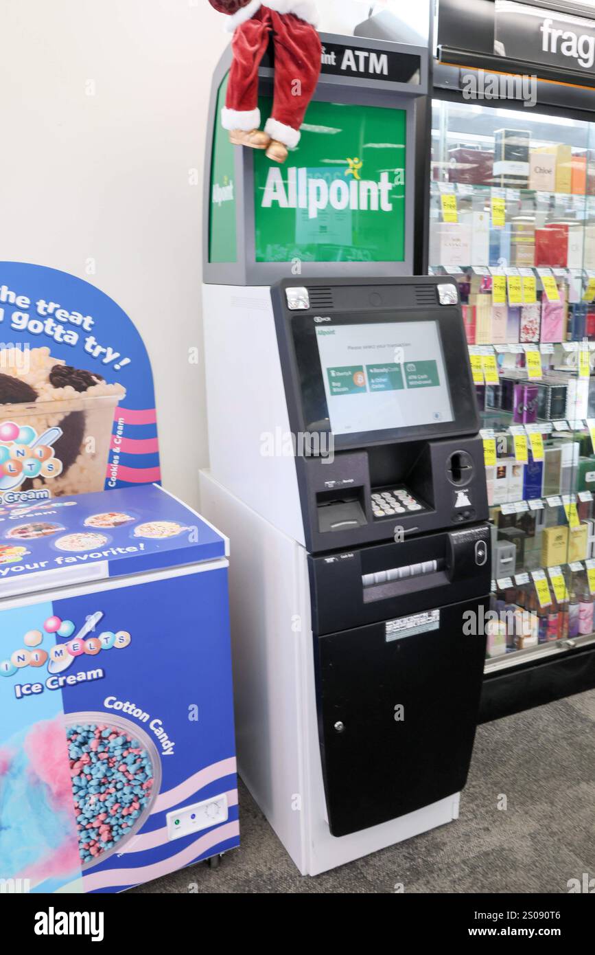A Bitcoin ATM is stationed near the front door of a CVS Pharmacy in ...