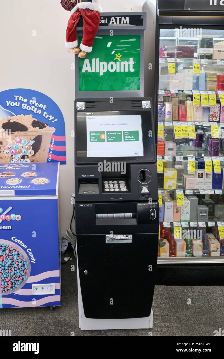 Mesa, USA. 24th Dec, 2024. A Bitcoin ATM is stationed near the front ...