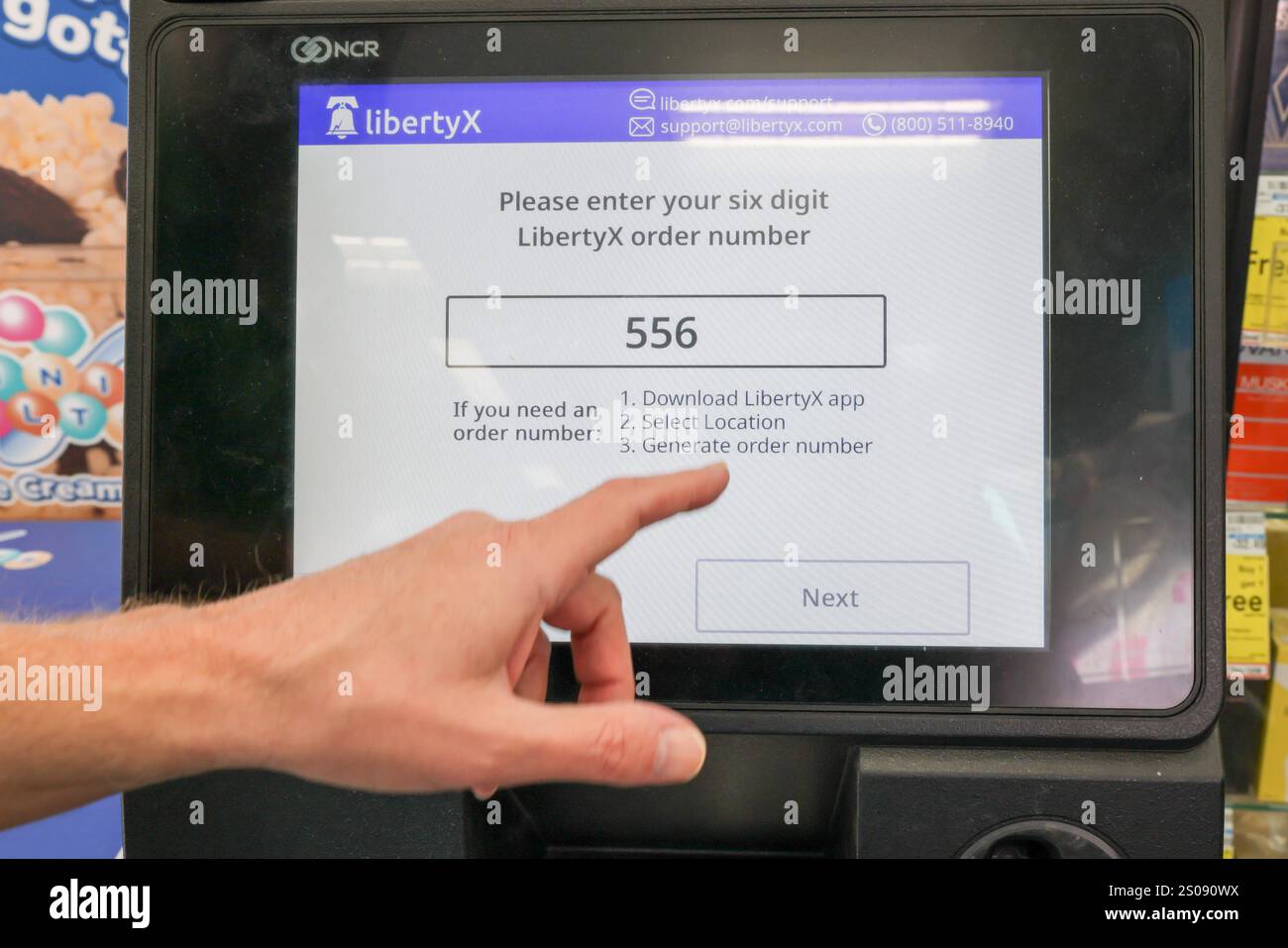 A Bitcoin ATM is stationed near the front door of a CVS Pharmacy in ...