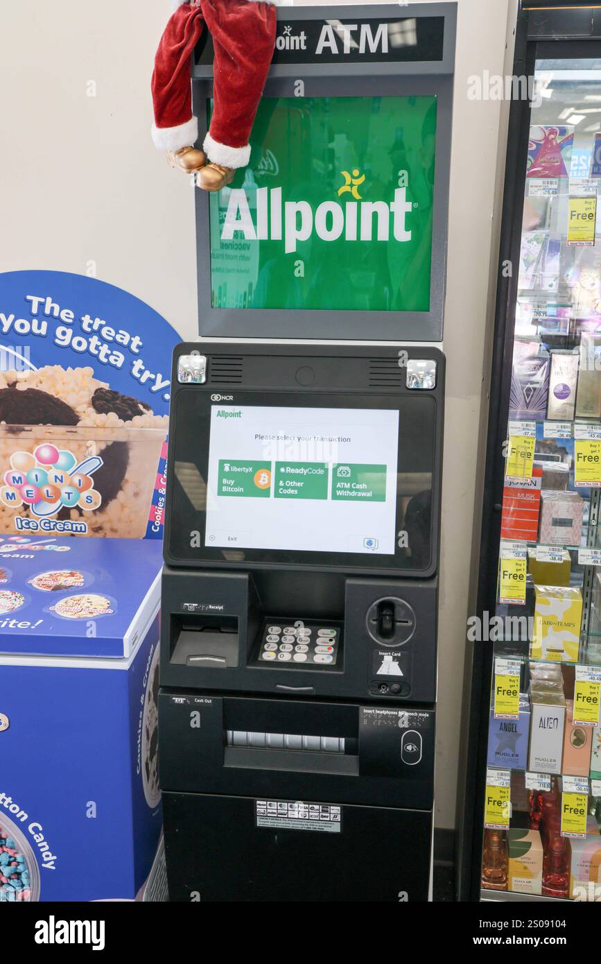 A Bitcoin ATM is stationed near the front door of a CVS Pharmacy in ...
