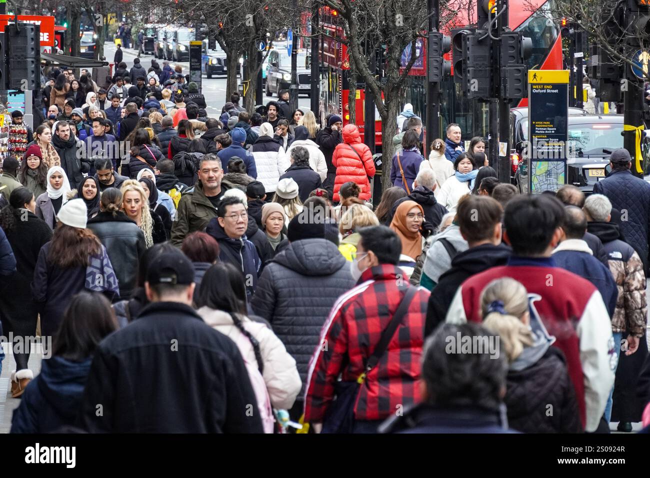 London, UK. 26th Dec, 2024. Boxing Day shoppers on Oxford Street ...