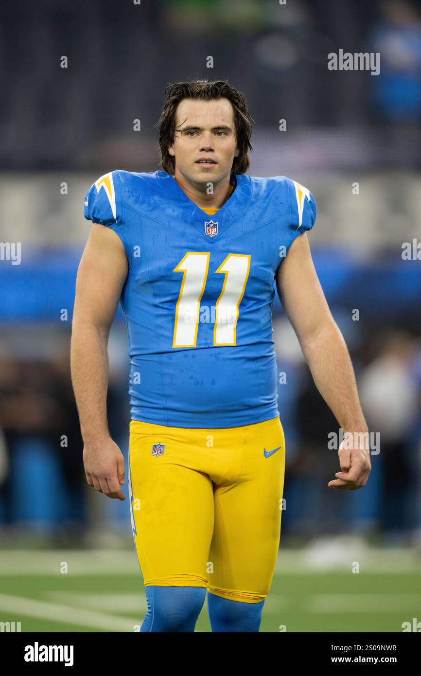 Los Angeles Chargers place kicker Cameron Dicker (11) walks on the field before an NFL football