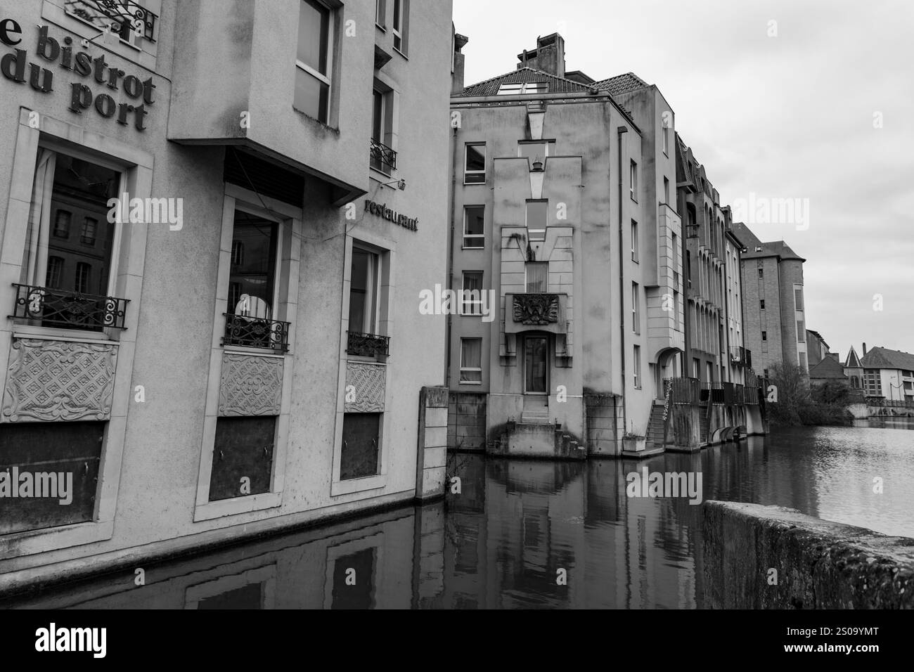 Metz, France - January 23, 2022: Cityscape view from the beautiful city of Metz in France. Bridges, houses and churches on the bank of the Moselle Riv Stock Photo