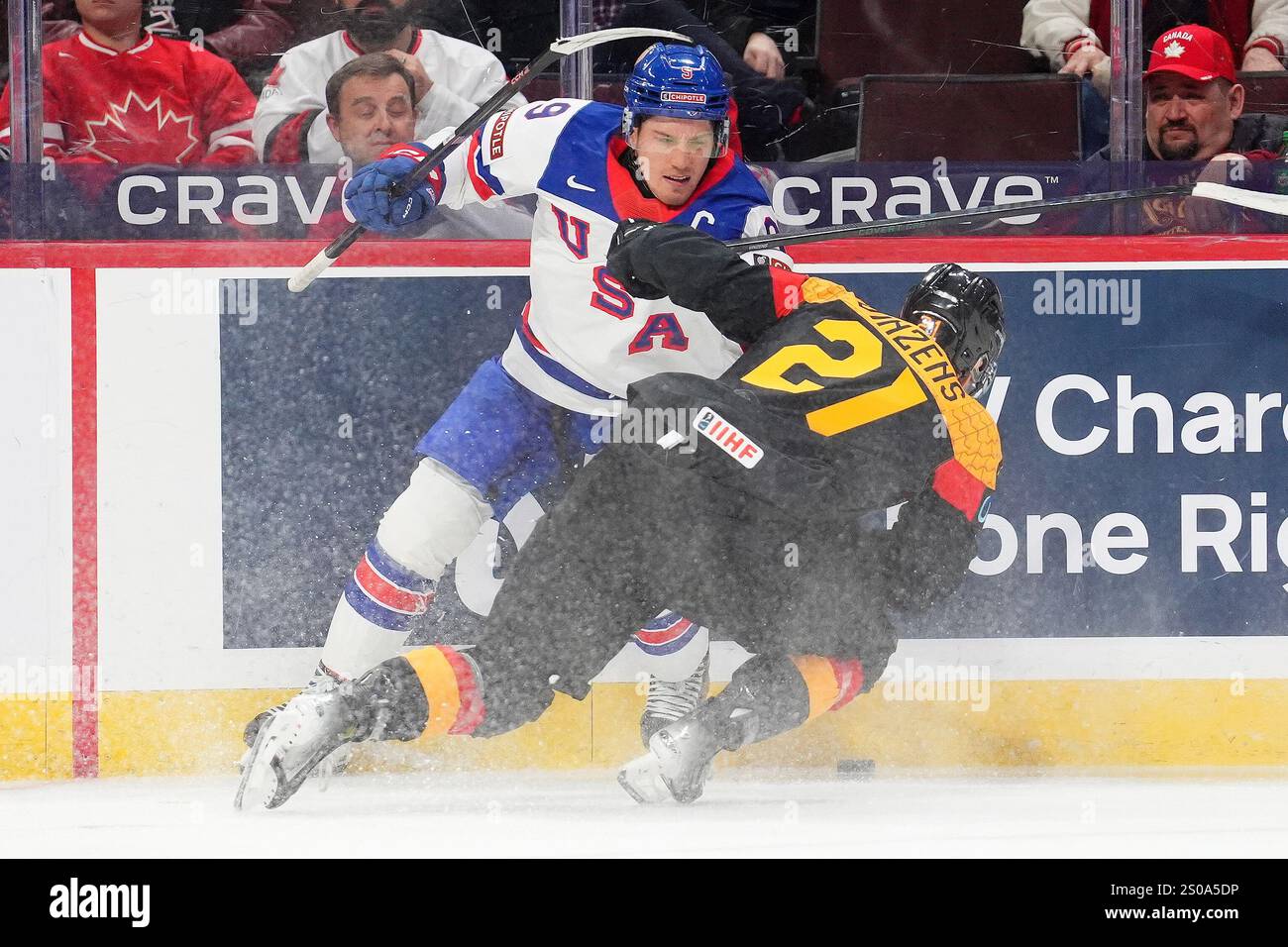 USA forward Ryan Leonard (9) and Germany forward Paul Vinzens (21) get