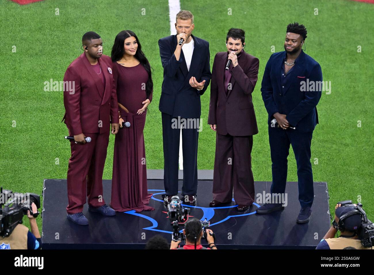 Pentatonix performs the national anthem prior to an NFL football game