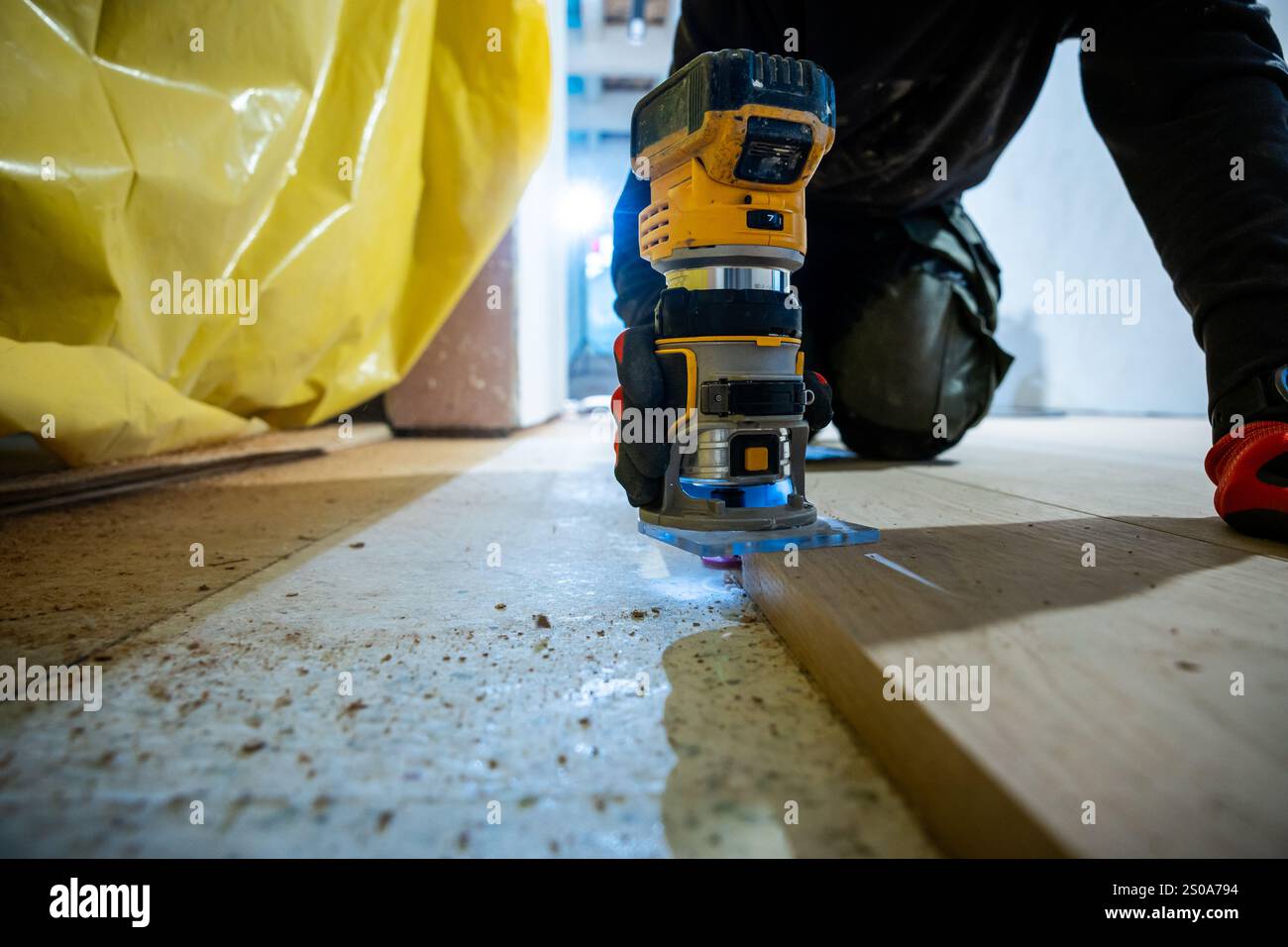 Skilled individual operates power tool hi-res stock photography and ...