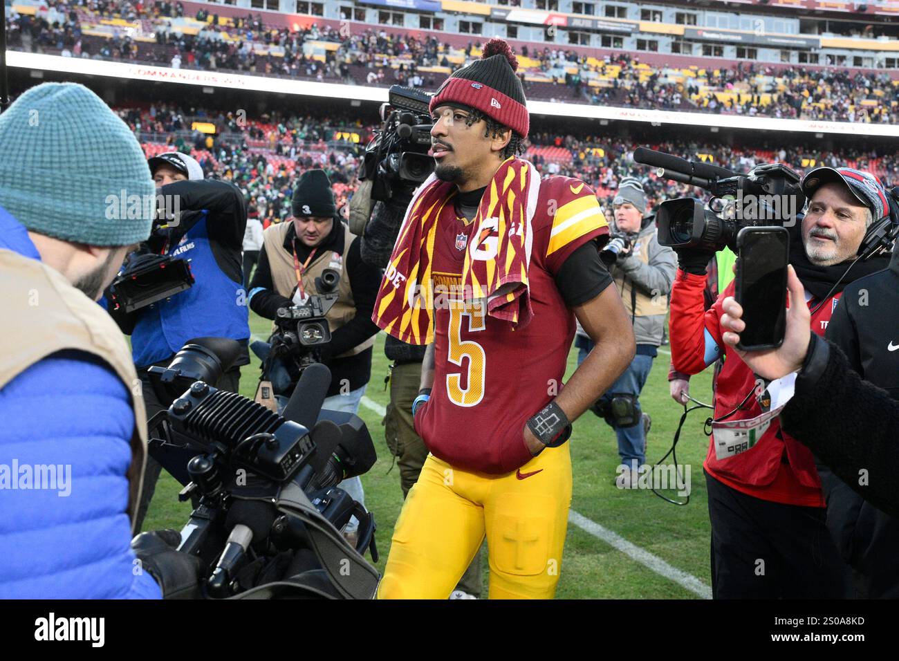 Washington Commanders quarterback Jayden Daniels (5) after an NFL