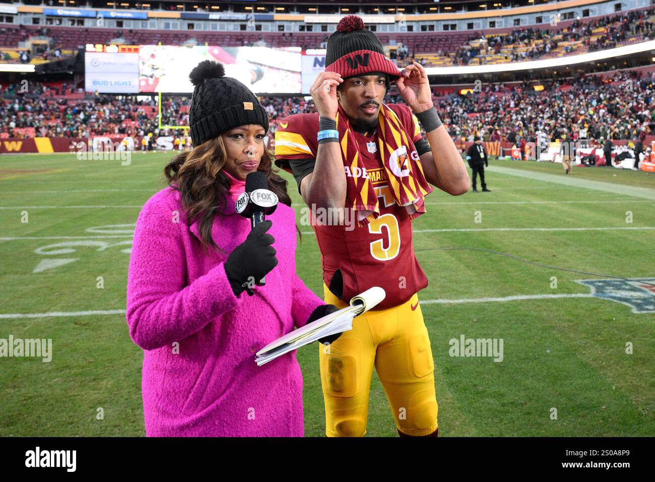 Washington Commanders quarterback Jayden Daniels (5) after an NFL