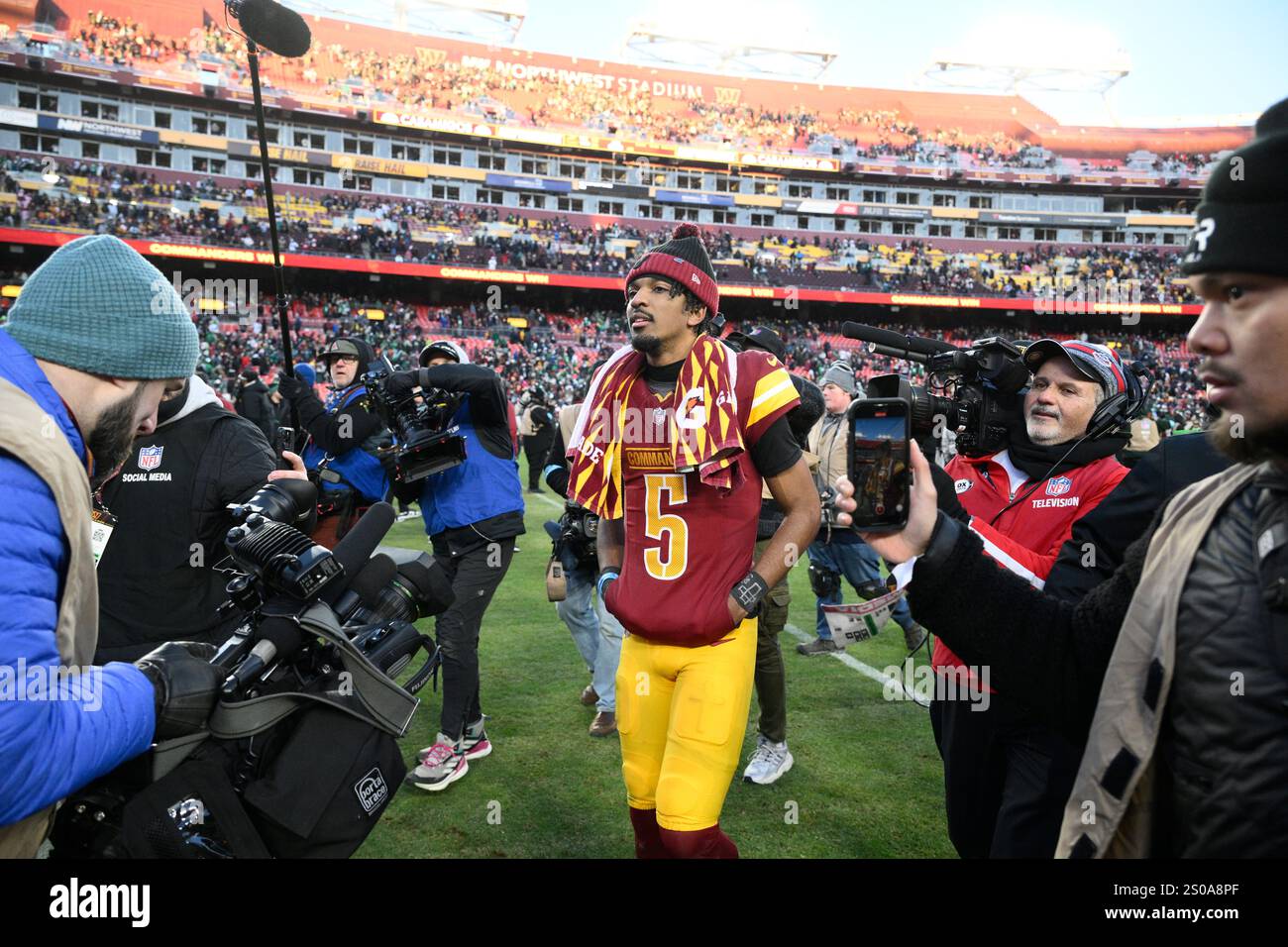 Washington Commanders quarterback Jayden Daniels (5) after an NFL