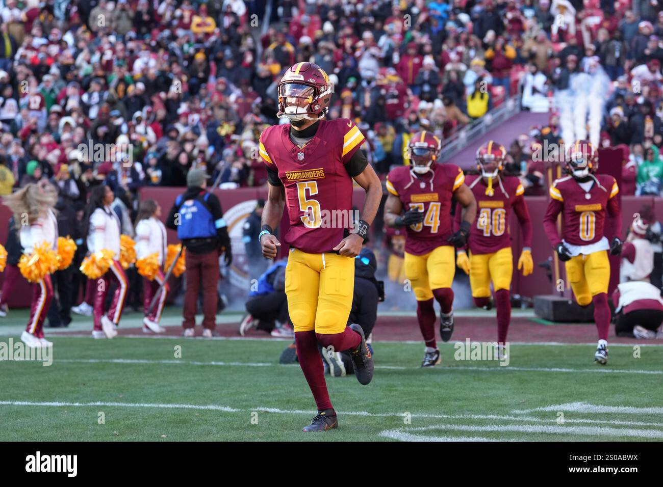 Washington Commanders quarterback Jayden Daniels (5) and the Washington