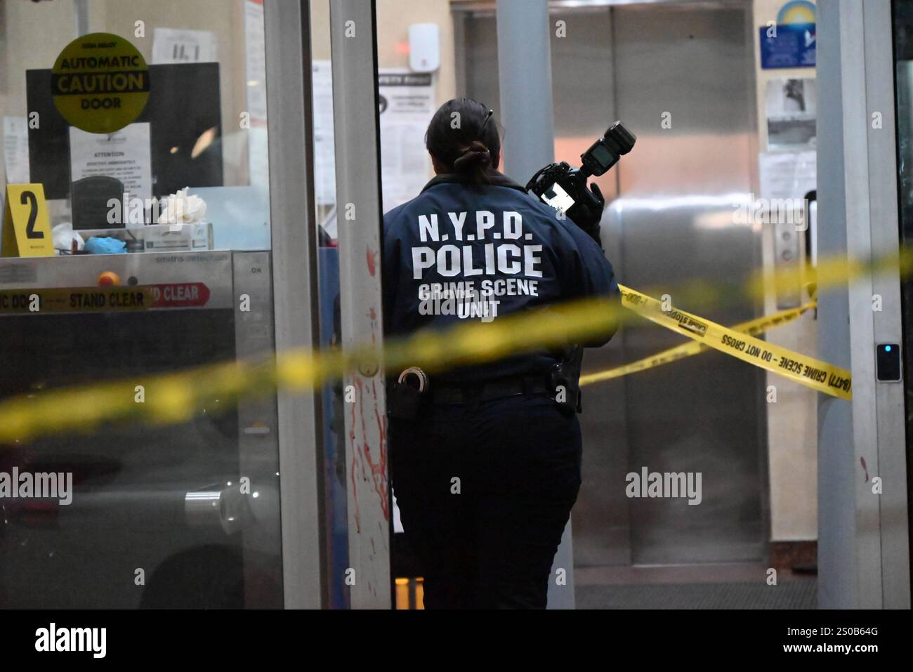 New York City Police Department Crime Scene Investigators at the scene ...